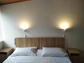 Cuarto Cama King Smart TV en apartamento ultimo piso Tunja